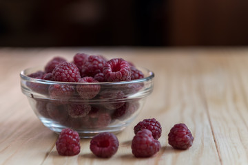 Fresh organic raspberries on a pile