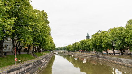 Fototapeta na wymiar River view from the Aurajoki river in the city of Turku.