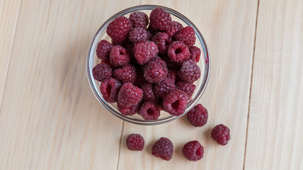 Fresh organic raspberries on a pile