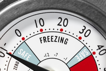 Refrigerator thermometer freezing area macro detail.