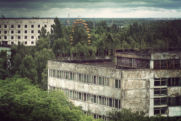 Fototapeta na wymiar View of Prypiat abandoned town near Chernobyl (Ukraine) with fameous ferrris wheel 