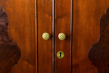 Brass Knobs on Antique Furniture
