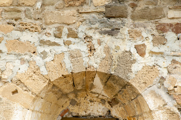 brick wall with arched masonry