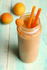 Apricot smoothies in a bottle