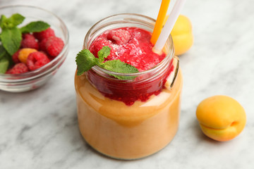 Apricot smoothie with raspberries