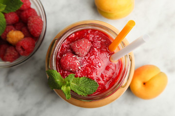 Apricot smoothie with raspberries