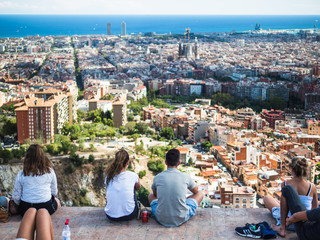 View of the tourists watching the city of Barcelona from the Carmel's bunkers - obrazy, fototapety, plakaty