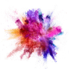 Explosion of coloured powder on white background