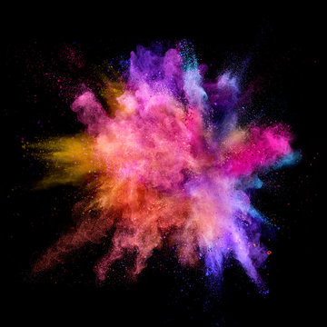 Explosion of coloured powder on black background © Jag_cz