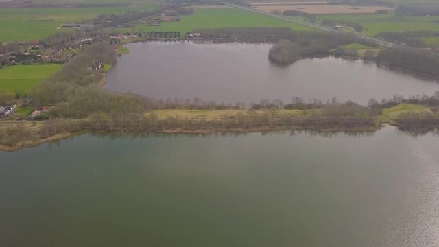 Flying over a dike between two lakes