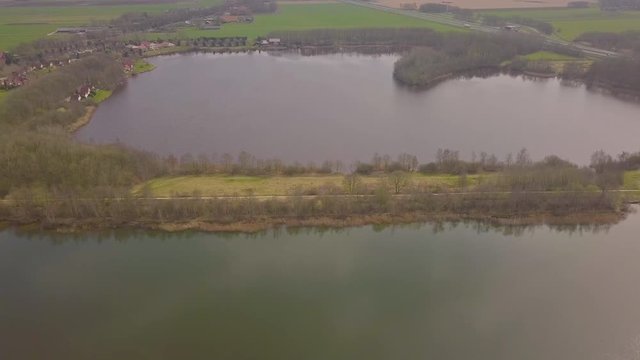 Flying over a dike between two lakes