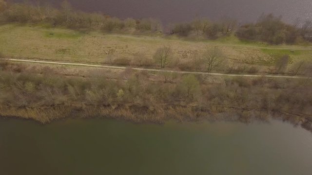 Flying over a dike between two lakes