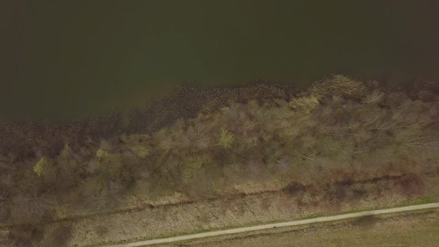 Flying over a dike between two lakes