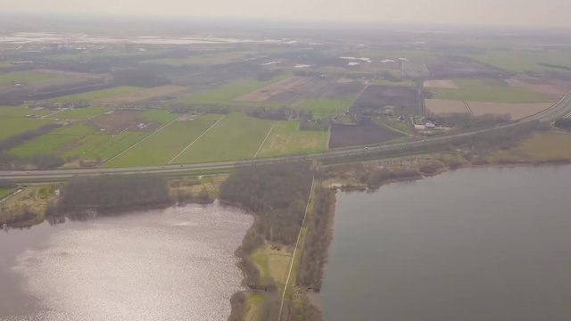 Flying over a dike between two lakes