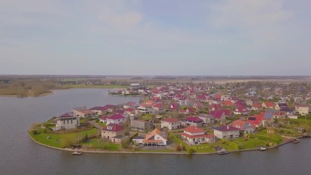 Residential area with luxurious villa's near a small lake