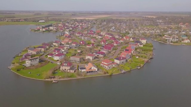 Residential area with luxurious villa's near a small lake