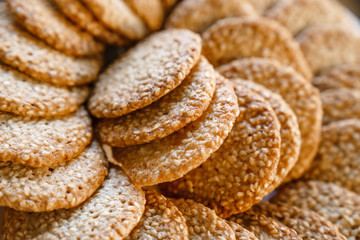 biscuits with sesame seeds. Delicious sweet confectionery. background, close-up, selective focus.