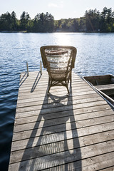 Rocking chair on small lake dock
