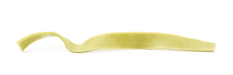 Single piece of fettucce pasta isolated