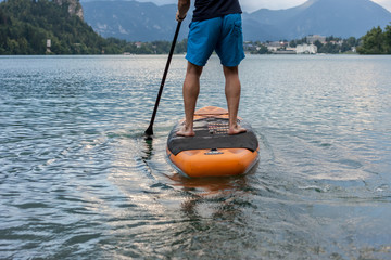 stand up paddle boarding on the lake
