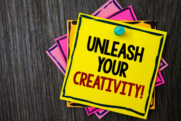 Text sign showing Unleash Your Creativity Call. Conceptual photo Develop Personal Intelligence Wittiness Wisdom Wooden background ideas messages intentions reflections communicate inform.