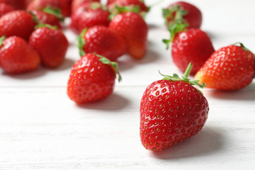 Ripe red strawberries on light background, closeup