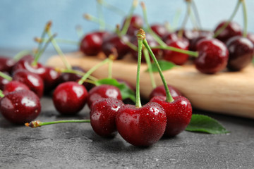 Sweet red cherries on table