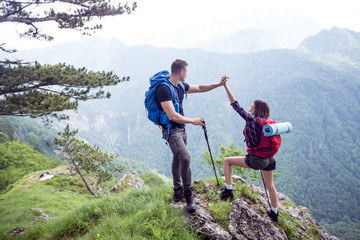 Happy hikers celebrate the successful hike