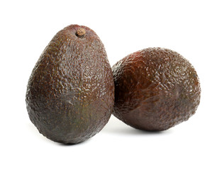 Ripe fresh avocados on white background