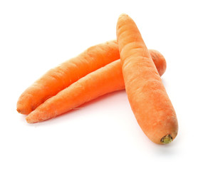 Ripe fresh carrots on white background