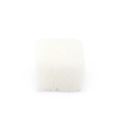 Single white sugar cube isolated