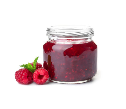 Naklejki Jar with delicious raspberry jam on white background