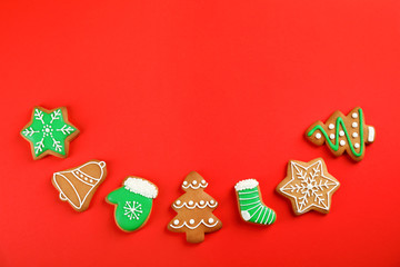Tasty homemade Christmas cookies on color background, top view