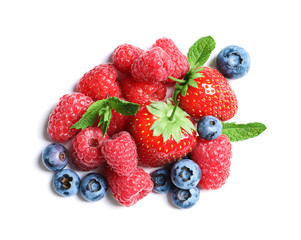 Raspberries, strawberries and blueberries on white background