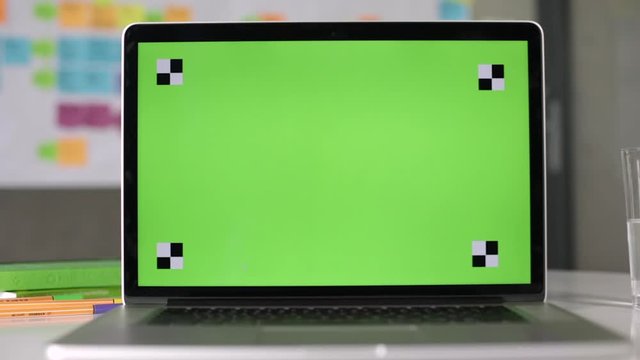 Zoom on green screen on the laptop