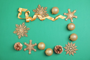 Flat lay Christmas composition with festive decor on color background