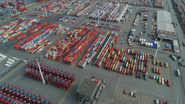 Drone shot flying over container terminal of the Port of Hamburg in Germany, the second largest industrial harbor in Europe 