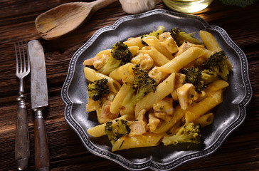 Penne pasta with broccoli and chicken with cheese sauce