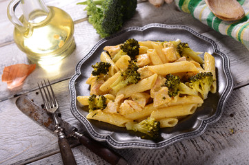 Penne pasta with broccoli and chicken with cheese sauce