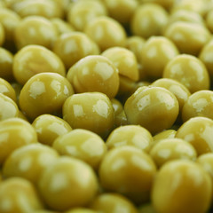 Surface covered with the green peas