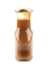 Bottle of caramel sauce isolated