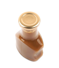 Bottle of caramel sauce isolated