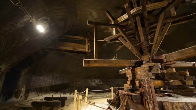 Old traditional extraction machine driven by horses, called Crivac in a salt mine gallery in Turda, Transylvania, Romania 