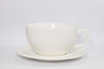 white glass cup coffee or tea for drinking , isolated