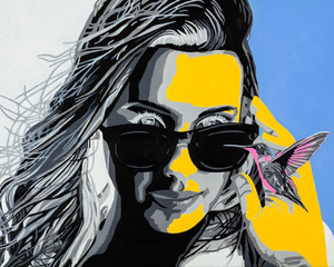 Pretty young woman modern art portrait with a hummingbird