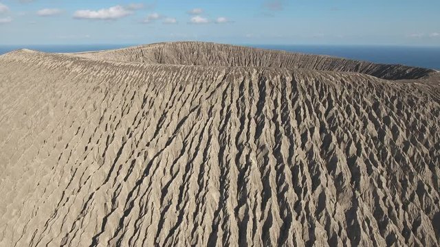 Amazing low aerial shot of volcano crater, volcanic island - San Benedicto