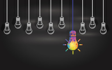 Light bulbs on a blackboard background. Human resources concept, recruiting eople with new ideas, thinking outside the box. Strategy and leadership. Planning and organization in new business.