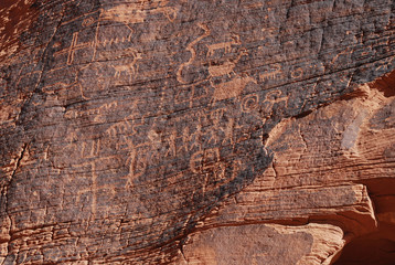 Ancient symbols on red sandstone
