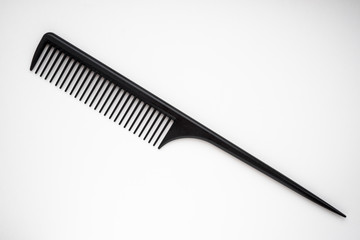 black comb on white background