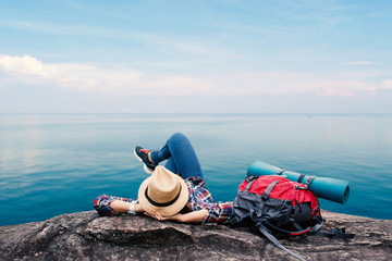 Happy Asian woman relaxing on holiday  travel concept,selective and soft focus,tone of hipster style